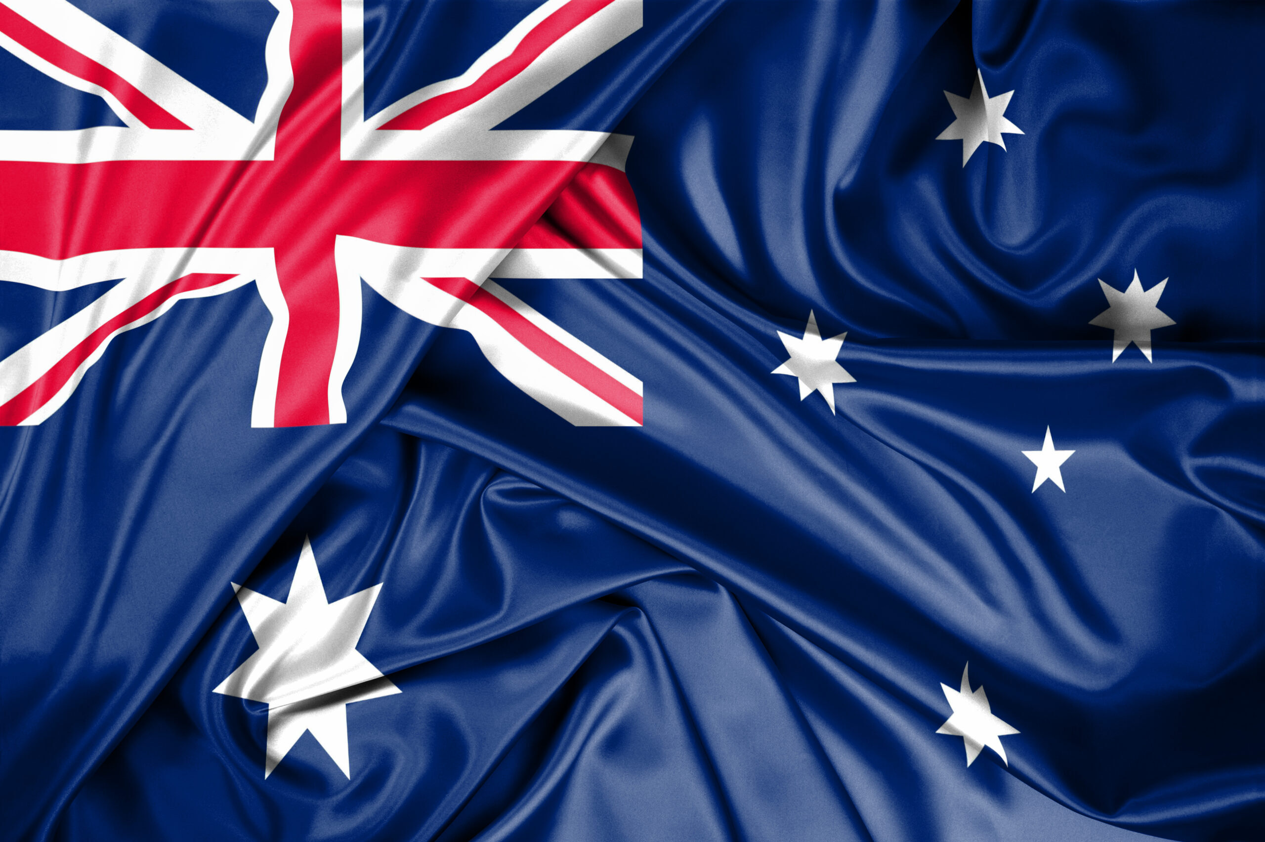 cropped-national-flag-australia-hoisted-outdoors-with-sky-background-australia-day-celebration-scaled-1.jpg